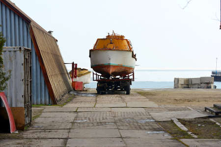 The diver at the parking lot in the dock is prepared for repair.の写真素材