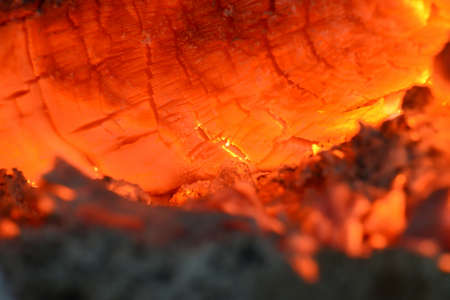 The hot heat in the oven, the flames from burning coals and firewoodの写真素材