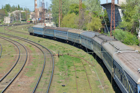 Railway from the top, view of the train from the bridge.