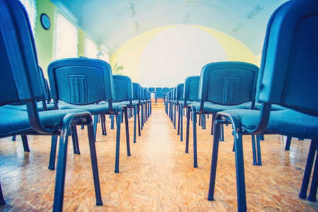 Chairs in the empty room for performances