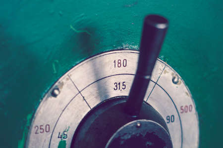 Old mechanical control panel of the machine, switching speeds through the reducerの写真素材