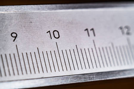 Slide calipers, numbers and scale of division on a measuring instrument, close-upの写真素材