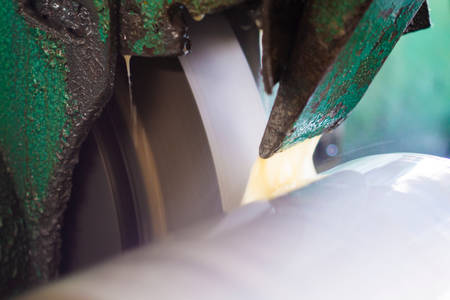 Abrasive grinding wheel on the machine close-upの写真素材