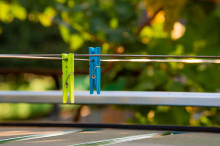 Clothespins colored on the clothesline.