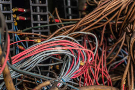 Old multicolored wires in the electrical cabinet of mechanical equipmentの写真素材