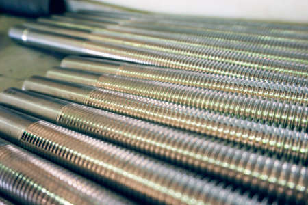 Round parts with rezboy after turning are on the rack in the shopの写真素材