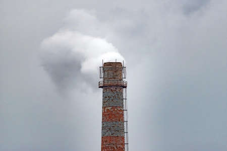 Smokestack at the factory with toxic gases.