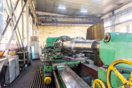 The big shaft is made on a huge lathe in the workshop