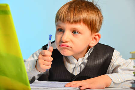 The little student is tired of the lessons and wants to rest.
