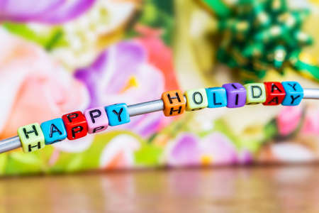 Text from decor, happy holiday, on a floral background
