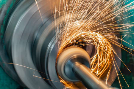Metal grinding, internal grinding with an abrasive wheel on a high-speed spindle of a circular grinding machine.の写真素材