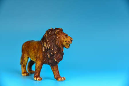 Toy animals made of plastic on a blue background, baby little animals.の写真素材