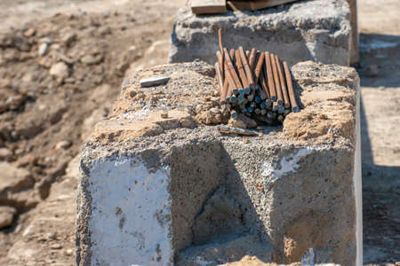 A bunch of iron rods at a construction site for the foundation.の写真素材