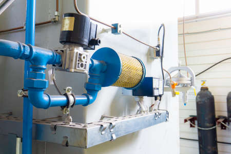 Gas industry, oxygen cylinders and pipes with valves, Air filter in the gas industry.の写真素材