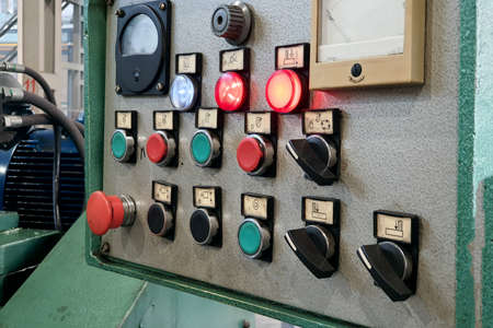 Mechanical control panel of a metalworking machine in production.の写真素材