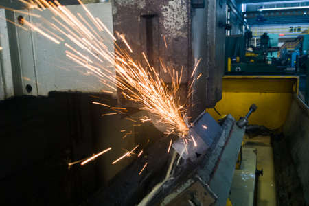 Grinding on a magnetic turntable on a surface grinding machine, grinding the angular surface of the...