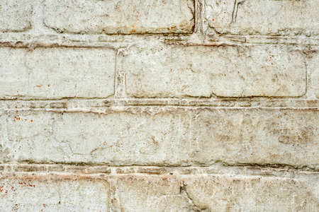 Texture of white silicate brick, a seam of brickwork on a brick wall