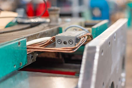 External hydraulic system of machine tools. Copper pipes for pressurized oil supply.