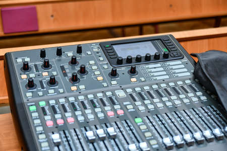 Musical mixing console before working in a recording studio.の写真素材