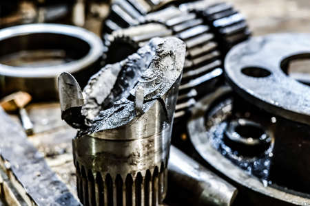 Burst gear shaft. Industrial accident and mechanical equipment repair.