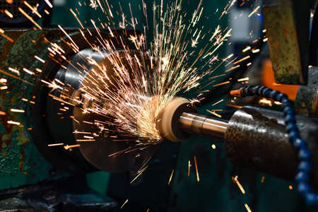 Face grinding with an abrasive stone on a circular grinding machine.の写真素材