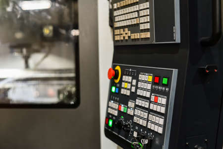 Control panel of a production CNC metalworking machine.の写真素材