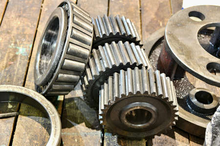 New cogwheel after fabrication and heat treatment on the rack.