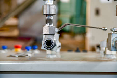 Fitting connection with a high pressure hose for supplying oil to the oil station.の写真素材