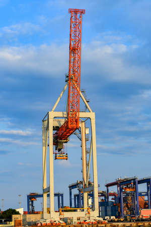 Full-slewing gantry crane in a seaport.