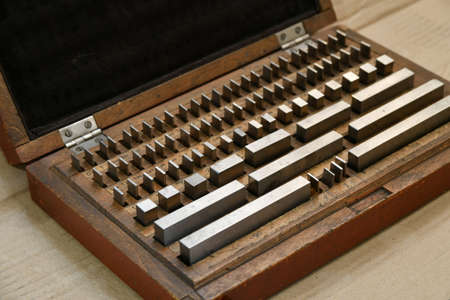 Measuring gauge blocks in industrial production.