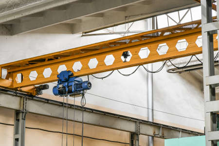 Overhead crane for lifting parts, assemblies and mechanisms at the factory.の写真素材