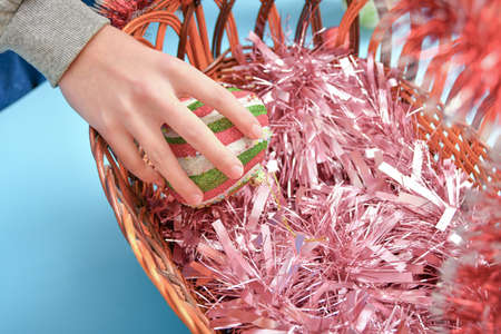 Burger with dollars lies on a platter on a blue wooden texture.の写真素材