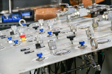 shift levers and control buttons of the high pressure hydraulic oil station.