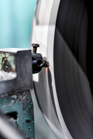 Cleaning the surface of the grinding wheel from adhesion of metal residues when grinding the surface...