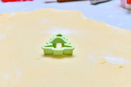 Green herringbone shape for baking cookies from rolled dough.の写真素材