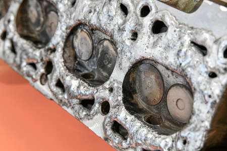 Removal of corrosion cavities on the surface of the cylinder head by welding and welding with argon.