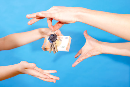 Handing over the keys to the apartment in exchange for money.