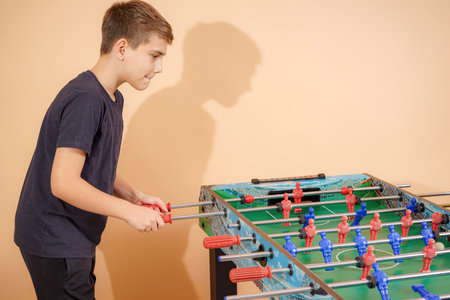 Children play table football.の写真素材
