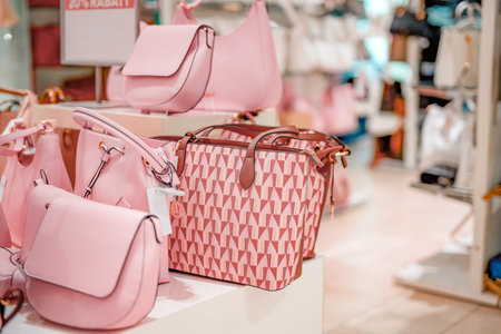Pink leather women's fashion bags on sale in the new collection store.の写真素材