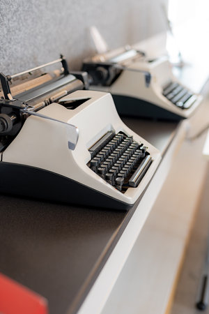 Electronic typewriters in a school classroom for study.