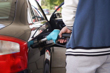 Refueling a car at a gas station.の写真素材