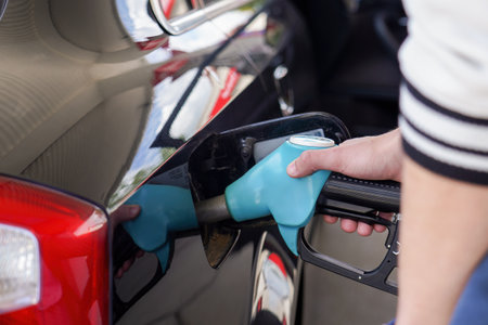 The driver fills his car with flammable fuel.の写真素材