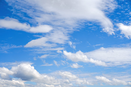 Blue sky with clouds of different shapes. Cloudy overcast sky.の写真素材