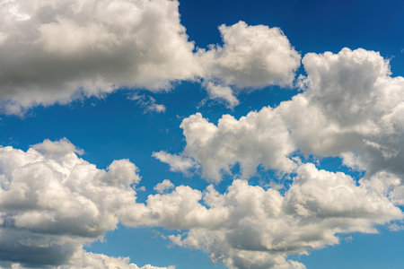 Blue sky with clouds of different shapes. Cloudy overcast sky.の写真素材