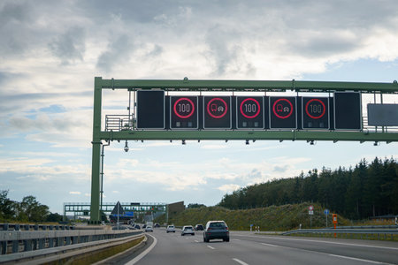 Electronic board and road signs on a high-speed highway.の写真素材