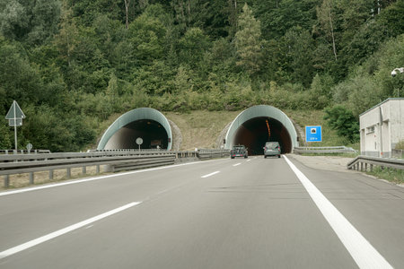 A car on a motorway in a tunnel drives along the road.の写真素材