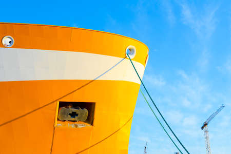 Yellow boat and sky with ropes