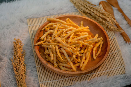Onion cakes on a wooden plateの写真素材