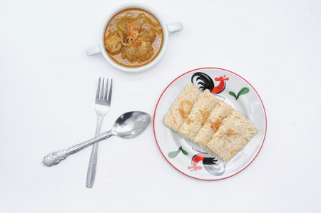 Roti Jala and Chicken Curry, traditional Malaysian Foodの写真素材