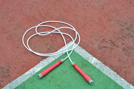 Skipping rope on the tennis court, closeup of photoの写真素材